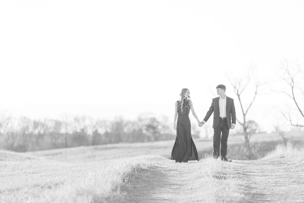 A flowing cocktail dress and tailored suite are a perfect combination for your engagement pictures.