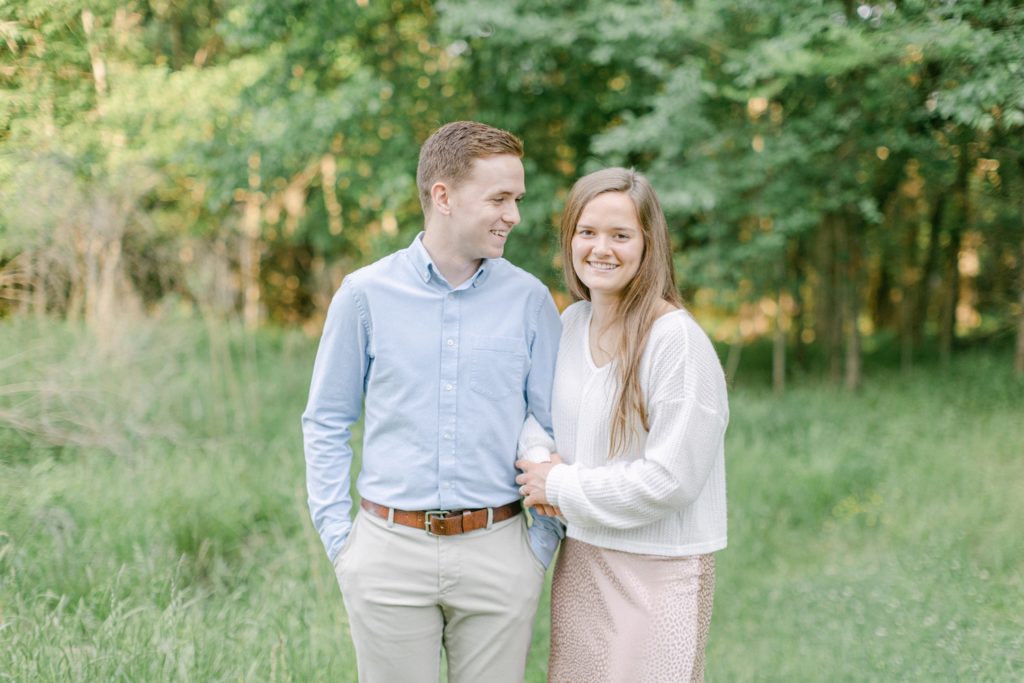 couple smiling at their engagement session